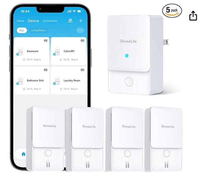 Image of a smartphone displaying a home automation app next to five white smart plugs from Govee Life, perfect for managing and controlling your smart home, even in areas prone to flooding like a basement. -PureOneServices